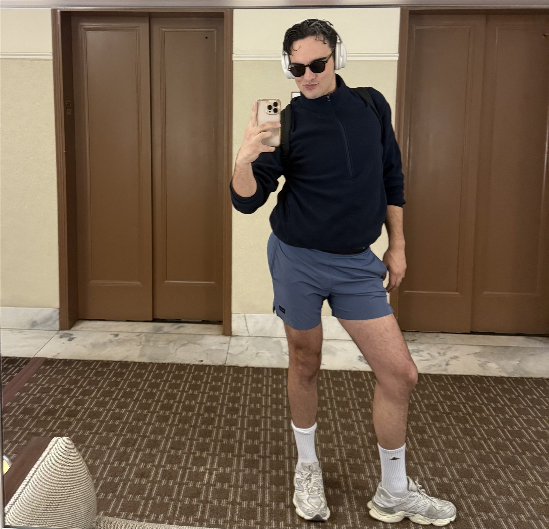 Peyton Farmer taking a playful mirror selfie